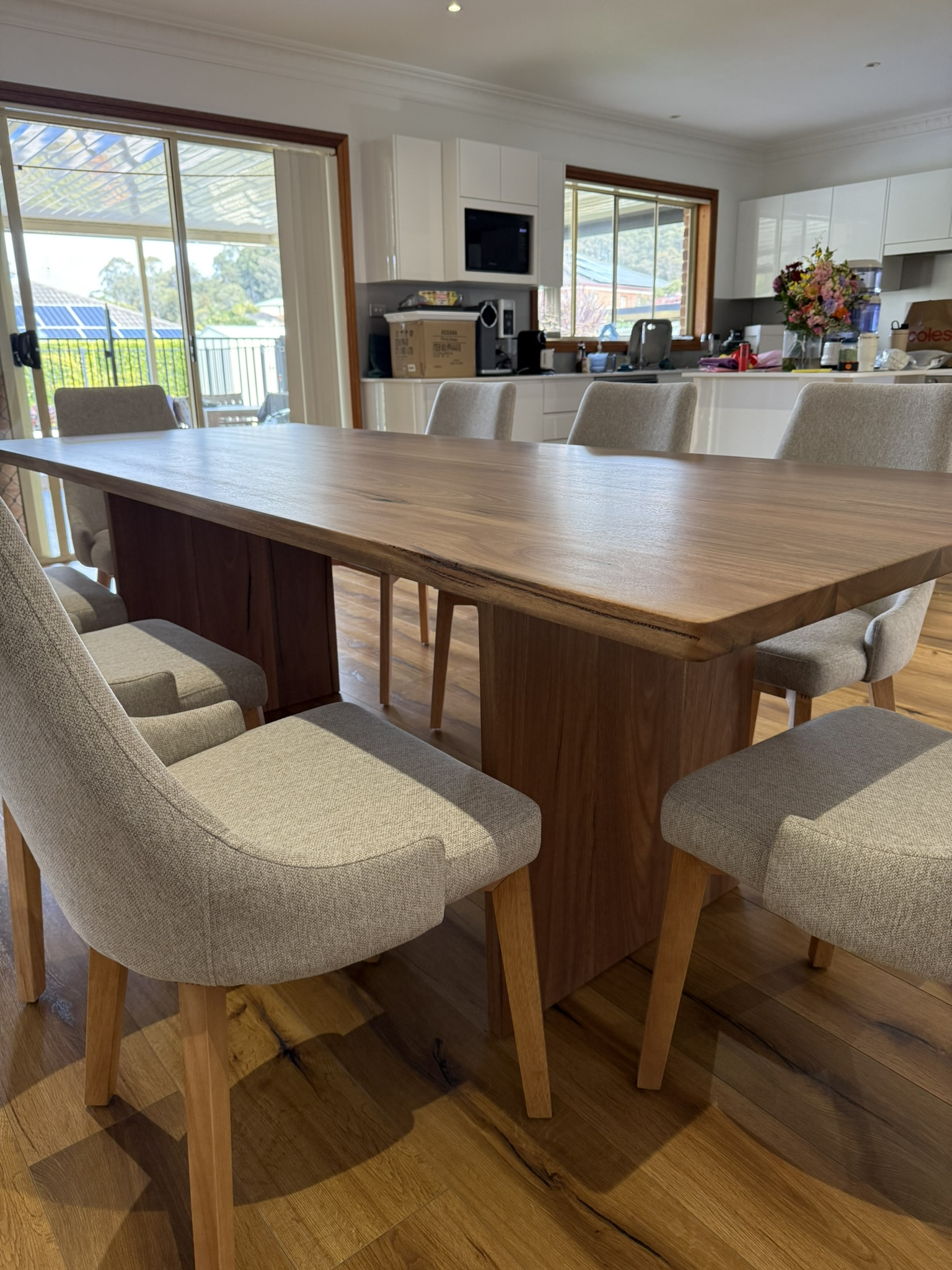 Custom solid spotted gum dining table in a Newcastle home