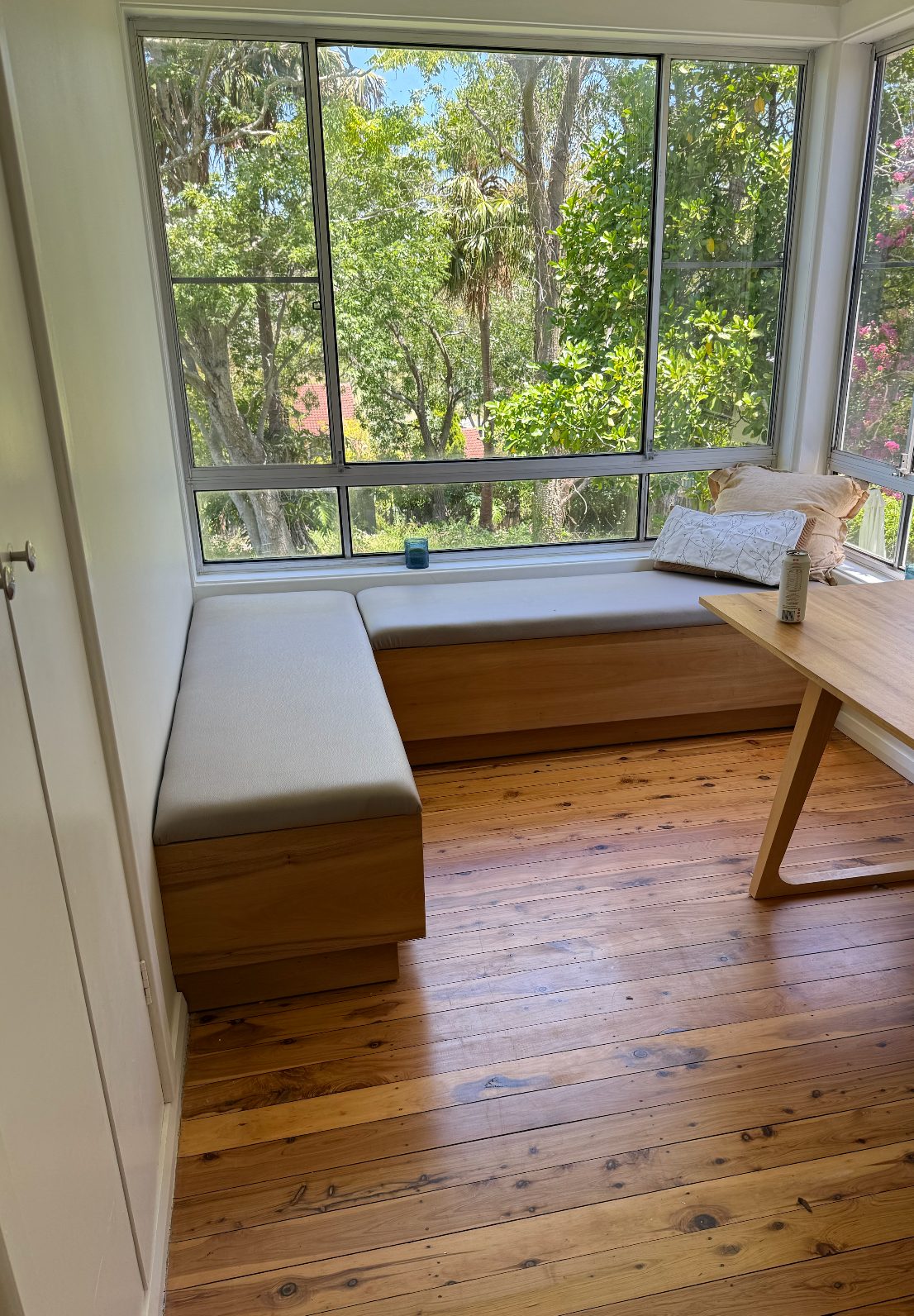 Built-in timber window seat with storage below